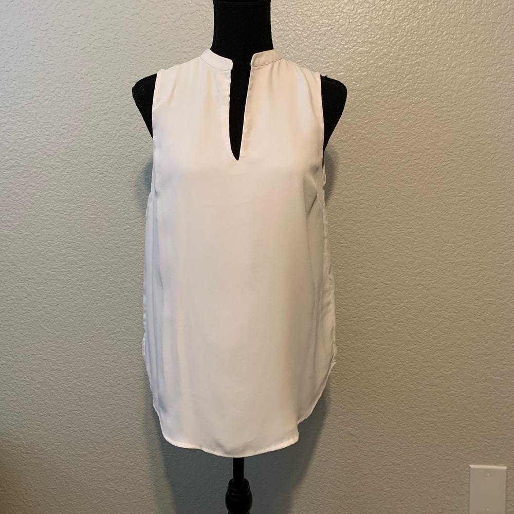 White sleeveless blouse